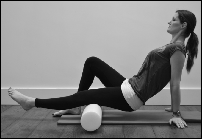Foam roller exercise for muscle tension in the hamstrings