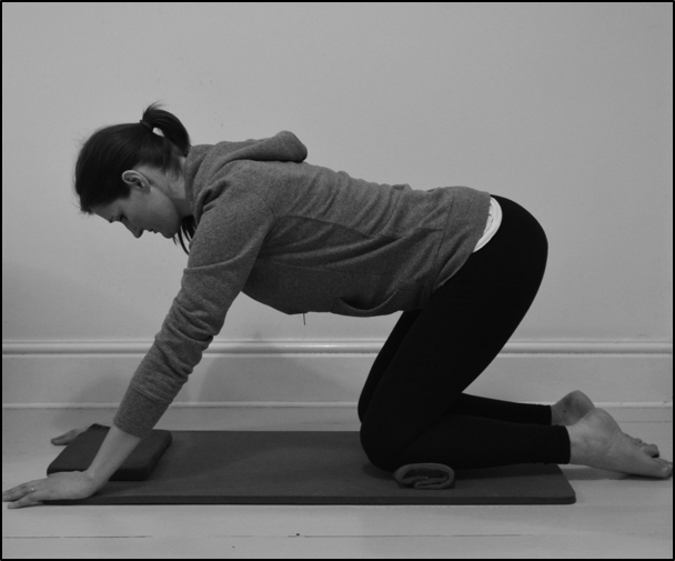stretch for the back of the hip joints